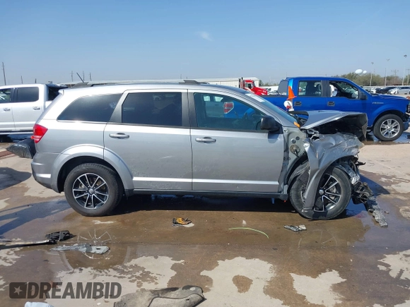 2017 Dodge Journey SE with VIN 3C4PDCABXHT662235, listed as a IAAI auction lot 41767844 with Not Provided miles and . Bid and sale history available at DreamBid. Image 13.