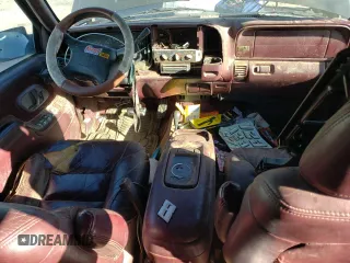1997 GMC Suburban z VIN 3GKFK16R3VG511306, wystawiony jako Copart lot #78504814 z przebiegiem 287 079 mil mil oraz Szkoda całkowita • Salvage title. Historia ofert i sprzedaży dostępna na DreamBid. Obrazek 8.