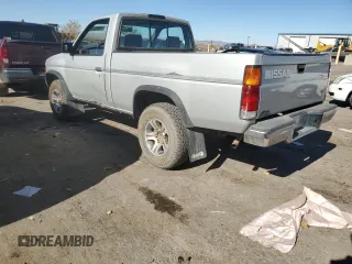 1996 Nissan Frontier XE z VIN 1N6SD11Y5TC327761, wystawiony jako Copart lot #79662594 z przebiegiem 151 631 mil mil oraz Szkoda całkowita • Salvage title. Historia ofert i sprzedaży dostępna na DreamBid. Obrazek 2.