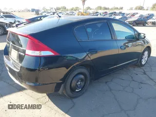 2010 Honda Insight EX with VIN JHMZE2H74AS012517, listed as a IAAI auction lot 41886588 with 227,428 mi miles and . Bid and sale history available at DreamBid. Image 4.