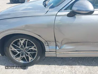 2022 Genesis GV70 2.5T с VIN KMUMADTB4NU059911, выставлен на аукционе IAAI как лот 42149577 с пробегом 22 070 миль миль и . История ставок и продаж доступна на DreamBid. Изображение 6.