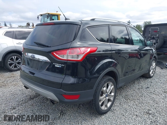 2014 Ford Escape Titanium with VIN 1FMCU9J95EUD60587, listed as a IAAI auction lot 42129854 with 155,559 mi miles and . Bid and sale history available at DreamBid. Image 4.