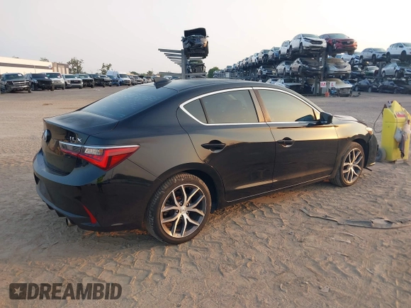 2019 Acura ILX Premium with VIN 19UDE2F7XKA001786, listed as a IAAI auction lot 42040373 with 74,586 mi miles and . Bid and sale history available at DreamBid. Image 4.