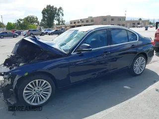 2012 BMW 3 Series 328i with VIN WBA3C1C57CF431824, listed as a IAAI auction lot 42585462 with 183,008 mi miles and . Bid and sale history available at DreamBid. Image 2.