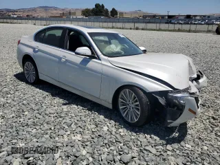 2014 BMW 3 Series 328i with VIN WBA3C1C53EK112799, listed as a Copart auction lot 61493585 with Not provided miles and Salvage title. Bid and sale history available at DreamBid. Image 4.