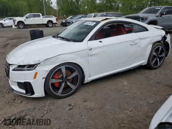 2023 Audi TTS z VIN TRUA1AFV0P1007101, wystawiony jako Copart lot #56334155 z przebiegiem 1 719 mil mil oraz Szkoda całkowita • Salvage title. Historia ofert i sprzedaży dostępna na DreamBid. Obrazek 1.