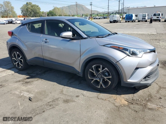 2019 Toyota C-HR XLE with VIN JTNKHMBX3K1050872, listed as a Copart auction lot 52247435 with 110,505 mi miles and Salvage Title. Bid and sale history available at carsss.com. Image 4.
