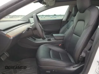 2020 Tesla Model 3 Standard Range Plus z VIN 5YJ3E1EA9LF661702, wystawiony jako Copart lot #55533725 z przebiegiem 66 286 mil mil oraz Szkoda całkowita • Salvage title. Historia ofert i sprzedaży dostępna na DreamBid. Obrazek 7.