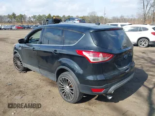 2014 Ford Escape SE with VIN 1FMCU9GXXEUA57133, listed as a IAAI auction lot 41642184 with 1 mi miles. Bid and sale history available at carsss.com. Image 3.