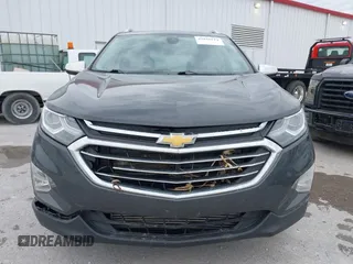 2021 Chevrolet Equinox Premier z VIN 2GNAXNEV9M6140537, wystawiony jako IAAI lot #42016514 z przebiegiem 52 237 mil mil oraz . Historia ofert i sprzedaży dostępna na DreamBid. Obrazek 12.