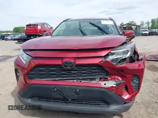 2019 Toyota RAV4 XLE with VIN JTMP1RFV2KD021348, listed as a IAAI auction lot 42198925 with 130,838 mi miles and . Bid and sale history available at DreamBid. Image 12.