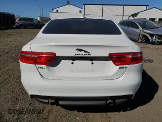 2019 Jaguar XE 25t with VIN SAJAR4FX8KCP52067, listed as a Copart auction lot 76584654 with 82,069 mi miles and Salvage Title. Bid and sale history available at carsss.com. Image 6.