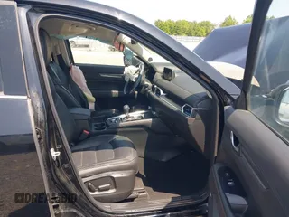 2020 Mazda CX-5 Grand Touring with VIN JM3KFADM9L1837183, listed as a IAAI auction lot 42340628 with 81,975 mi miles and . Bid and sale history available at DreamBid. Image 5.