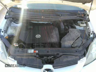 2007 Mazda 5 Touring with VIN JM1CR293770157482, listed as a IAAI auction lot 41482451 with 220,195 mi miles and . Bid and sale history available at DreamBid. Image 10.