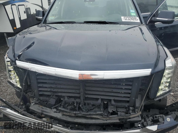 2017 Cadillac Escalade Luxury with VIN 1GYS4BKJ2HR236875, listed as a Copart auction lot 52328095 with 103,335 mi miles and Salvage title. Bid and sale history available at DreamBid. Image 12.
