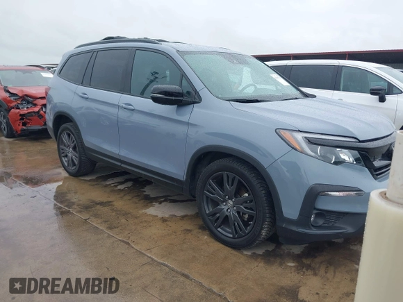 2022 Honda Pilot Sport z VIN 5FNYF5H34NB019222, wystawiony jako IAAI lot #41905708 z przebiegiem 143 397 mil mil oraz . Historia ofert i sprzedaży dostępna na DreamBid. Obrazek 1.