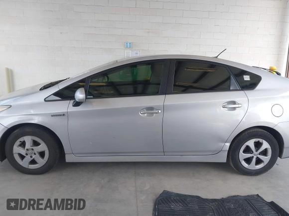 2015 Toyota Prius Four z VIN JTDKN3DU8F0427475, wystawiony jako IAAI lot #42338538 z przebiegiem 295 283 mil mil oraz . Historia ofert i sprzedaży dostępna na DreamBid. Obrazek 14.