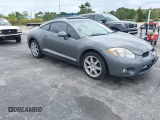 2006 Mitsubishi Eclipse GT with VIN 4A3AK34T86E048617, listed as a IAAI auction lot 42166851 with 128,716 mi miles. Bid and sale history available at carsss.com. Image 1.