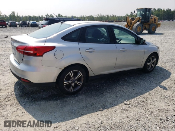 2016 Ford Focus SE with VIN 1FADP3FE8GL353103, listed as a Copart auction lot 64972865 with 131,403 mi miles and Clean title. Bid and sale history available at DreamBid. Image 3.