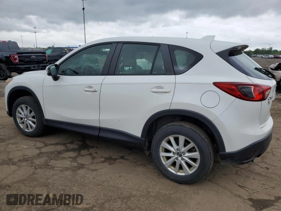 2014 Mazda CX-5 Sport with VIN JM3KE2BE8E0374434, listed as a Copart auction lot 61615445 with 111,330 mi miles and Clean title. Bid and sale history available at DreamBid. Image 2.