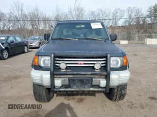 1995 Mitsubishi Montero z VIN JA4MR41H7SJ010597, wystawiony jako IAAI lot #41610885 z przebiegiem 162 406 mil mil oraz . Historia ofert i sprzedaży dostępna na DreamBid. Obrazek 6.