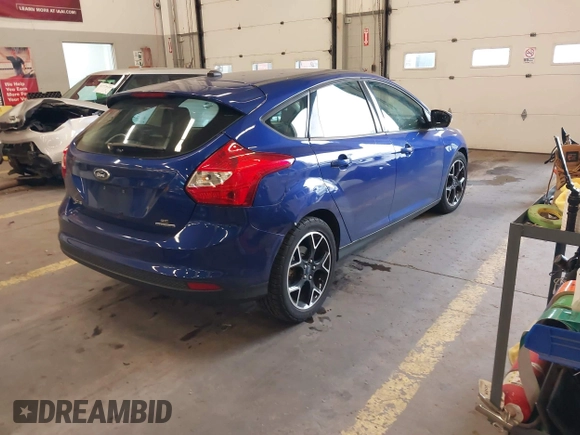 2013 Ford Focus SE with VIN 1FADP3K26DL336078, listed as a IAAI auction lot 41754365 with 104,568 mi miles. Bid and sale history available at carsss.com. Image 4.