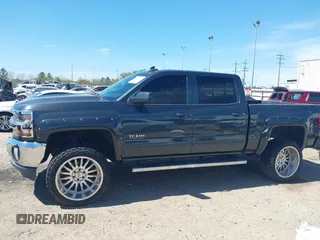 2018 Chevrolet Silverado 1500 LT with VIN 3GCPCREC1JG127396, listed as a IAAI auction lot 41790850 with 138,725 mi miles and . Bid and sale history available at DreamBid. Image 15.