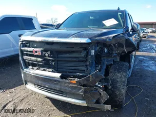 2022 GMC Yukon XL SLT with VIN 1GKS2GKDXNR134694, listed as a IAAI auction lot 41475723 with 52,579 mi miles. Bid and sale history available at carsss.com. Image 6.
