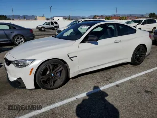 2015 BMW M4 with VIN WBS3R9C55FK330561, listed as a Copart auction lot 40490133 with 65,127 mi miles. Bid and sale history available at carsss.com. Image 1.
