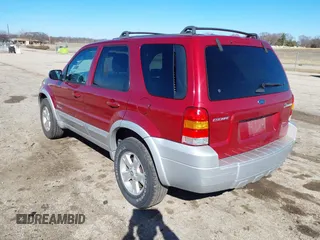 2005 Ford Escape Hybrid with VIN 1FMYU96H05KE01130, listed as a IAAI auction lot 41711338 with 288,964 mi miles. Bid and sale history available at carsss.com. Image 3.