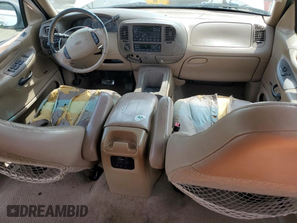 1999 Ford Expedition XLT z VIN 1FMPU18L0XLC10111, wystawiony jako Copart lot #52699205 z przebiegiem Nie podano mil oraz Szkoda całkowita • Salvage title. Historia ofert i sprzedaży dostępna na DreamBid. Obrazek 8.