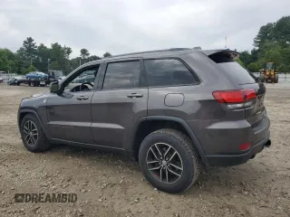 2018 Jeep Grand Cherokee Trailhawk with VIN 1C4RJFLG1JC264781, listed as a Copart auction lot 61524135 with 82,786 mi miles and Salvage title. Bid and sale history available at DreamBid. Image 2.