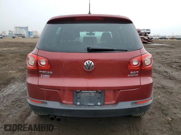 2011 Volkswagen Tiguan SE with VIN WVGBV7AXXBW001845, listed as a Copart auction lot 52414935 with 256,311 mi miles and Salvage Title. Bid and sale history available at DreamBid. Image 6.