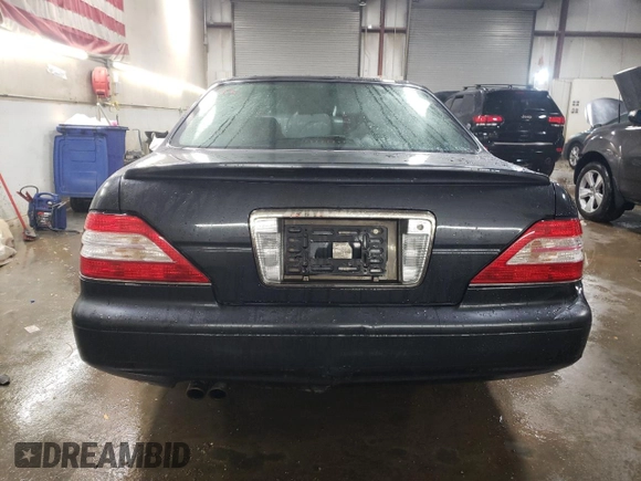 1997 Nissan Maxima with VIN HBY33200347, listed as a Copart auction lot 47182085 with 173,662 mi miles and Salvage title. Bid and sale history available at DreamBid. Image 6.