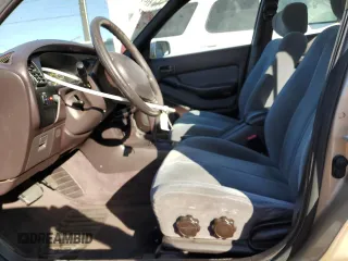 1992 Toyota Camry LE with VIN 4T1SK12E6NU059325, listed as a Copart auction lot 80712404 with 163,685 mi miles and Salvage Title. Bid and sale history available at carsss.com. Image 7.