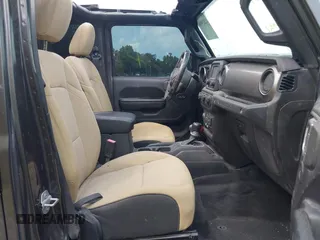 2020 Jeep Wrangler Unlimited Sport S with VIN 1C4HJXDN7LW113735, listed as a IAAI auction lot 42639884 with 48,736 mi miles and . Bid and sale history available at DreamBid. Image 5.