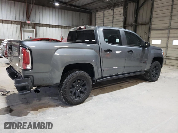 2022 GMC Canyon 4WD AT4 w/Leather with VIN 1GTG6FEN1N1175900, listed as a Copart auction lot 85957514 with 56,811 mi miles and Salvage Title. Bid and sale history available at carsss.com. Image 3.