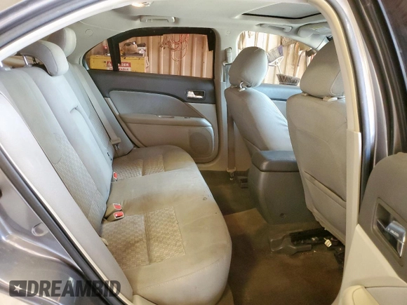 2012 Ford Fusion SE z VIN 3FAHP0HA1CR320160, wystawiony jako Copart lot #57597615 z przebiegiem 142 938 mil mil oraz Szkoda całkowita • Salvage title. Historia ofert i sprzedaży dostępna na DreamBid. Obrazek 10.