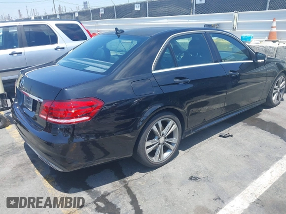 2014 Mercedes-Benz E 350 Sport with VIN WDDHF5KB1EB015573, listed as a IAAI auction lot 42731599 with 233,540 mi miles and . Bid and sale history available at DreamBid. Image 4.