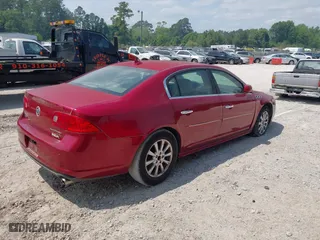 2011 Buick Lucerne CXL Premium with VIN 1G4HJ5EM7BU107126, listed as a IAAI auction lot 42093773 with 188,907 mi miles. Bid and sale history available at carsss.com. Image 4.