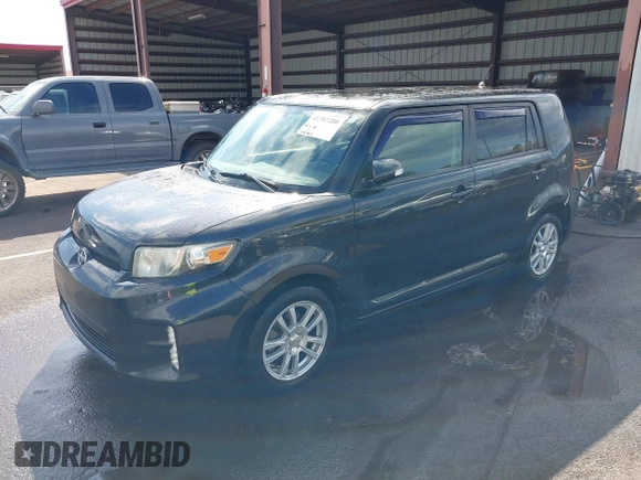 2014 Scion xB with VIN JTLZE4FE4EJ064549, listed as a IAAI auction lot 41392280 with 148,962 mi miles. Bid and sale history available at carsss.com. Image 2.
