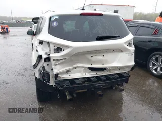2014 Ford Escape Titanium with VIN 1FMCU9J94EUD49614, listed as a IAAI auction lot 42005864 with 87,779 mi miles. Bid and sale history available at carsss.com. Image 6.