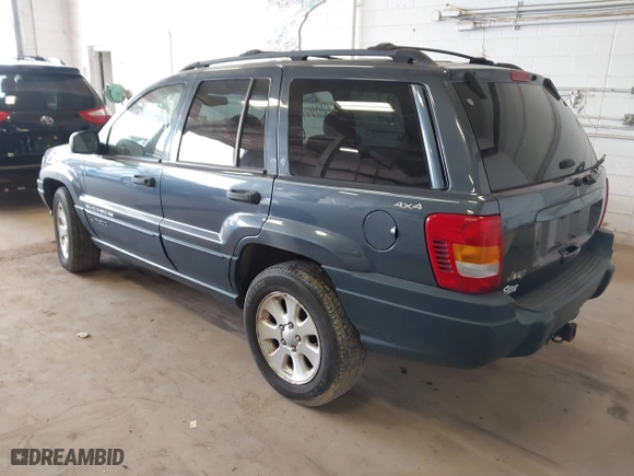 2001 Jeep Grand Cherokee Laredo with VIN 1J4GW48S91C525711, listed as a IAAI auction lot 42048952 with 1 mi miles. Bid and sale history available at carsss.com. Image 3.