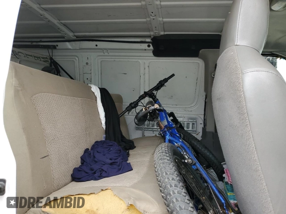2009 Ford Econoline Cargo Commercial z VIN 1FTSE34L39DA01410, wystawiony jako Copart lot #77798344 z przebiegiem Nie podano mil oraz Szkoda całkowita • Salvage title. Historia ofert i sprzedaży dostępna na DreamBid. Obrazek 11.