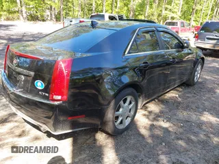 2009 Cadillac CTS RWD w/1SB with VIN 1G6DU57V590105458, listed as a IAAI auction lot 42139093 with 105,983 mi miles. Bid and sale history available at carsss.com. Image 4.