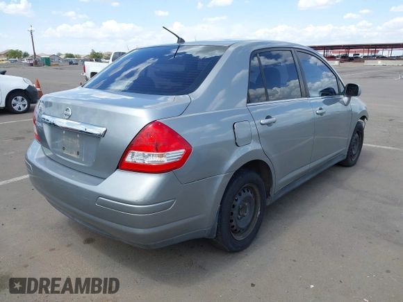 2009 Nissan Versa 1.8 S with VIN 3N1BC11E39L381507, listed as a IAAI auction lot 41956643 with 120,730 mi miles. Bid and sale history available at carsss.com. Image 4.