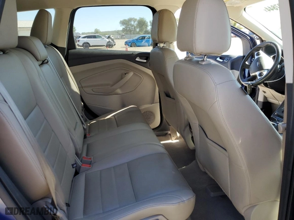 2015 Ford Escape Titanium with VIN 1FMCU0J92FUB90086, listed as a Copart auction lot 73597844 with 91,586 mi miles and Salvage Title. Bid and sale history available at carsss.com. Image 11.