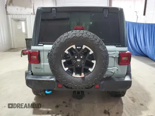 2024 Jeep Wrangler Rubicon with VIN 1C4RJXR67RW293197, listed as a Copart auction lot 59886995 with Not provided miles and Salvage title. Bid and sale history available at DreamBid. Image 6.