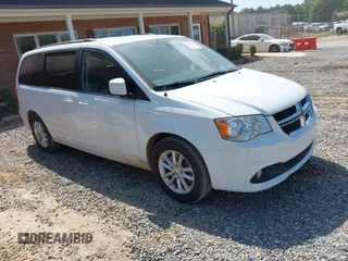 2018 Dodge Grand Caravan SXT z VIN 2C4RDGCG0JR360521, wystawiony jako IAAI lot #42716080 z przebiegiem 104 238 mil mil oraz . Historia ofert i sprzedaży dostępna na DreamBid. Obrazek 1.