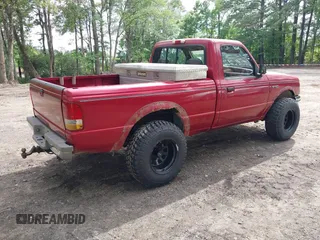 1994 Ford Ranger Splash z VIN 1FTCR11U0RTA95519, wystawiony jako IAAI lot #42476046 z przebiegiem 258 841 mil mil oraz . Historia ofert i sprzedaży dostępna na DreamBid. Obrazek 4.